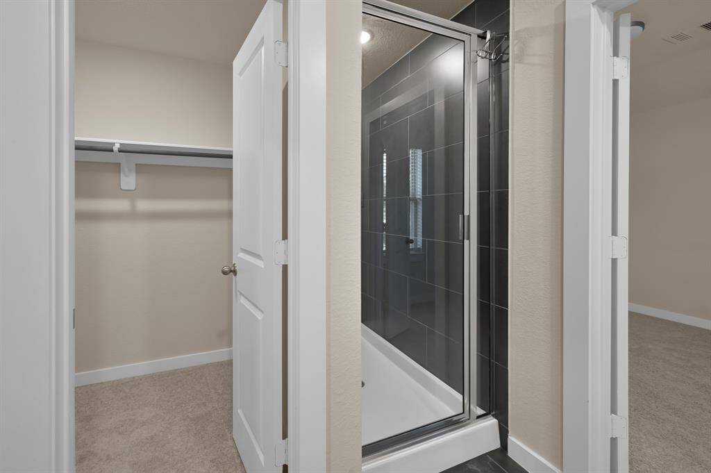 Standing shower and walk in closet for the 2nd upstairs bedroom
