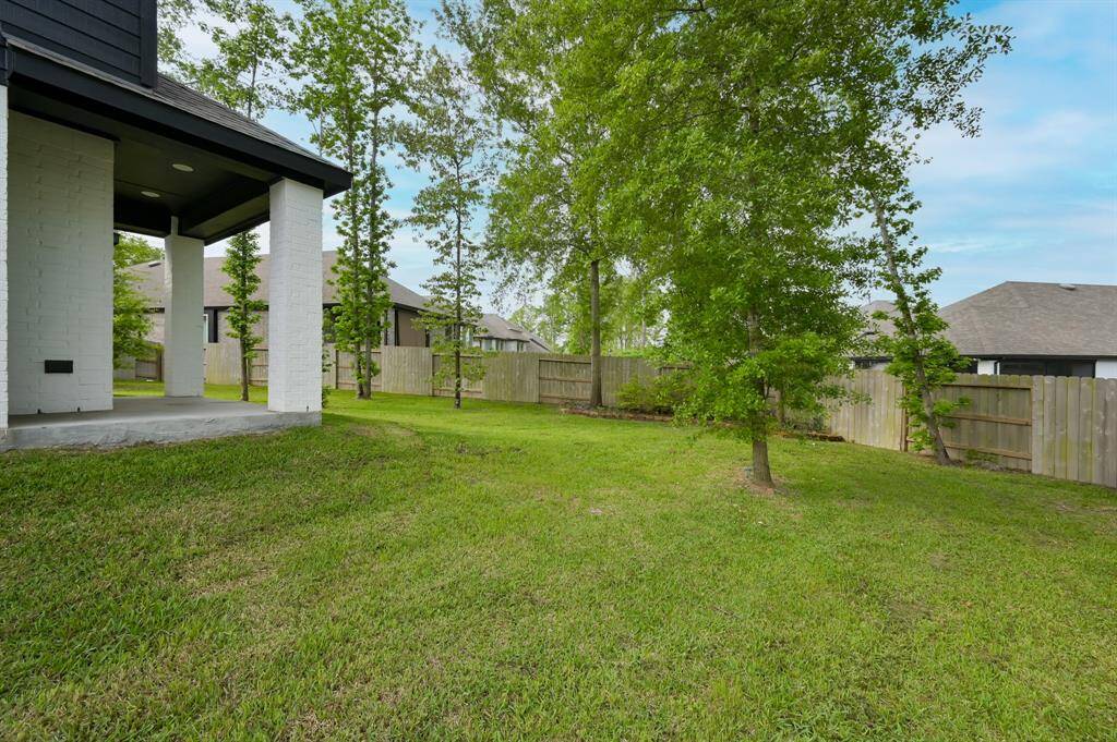 The side yard on this premium over sized lot.
