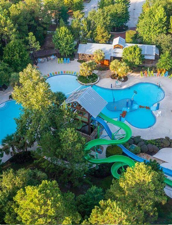 Located at The Palm, Forest Island, an exciting 16-acre tennis and aquatics center, is a focal point of fun in the community, complete with four tennis courts, four pickleball courts,  a basketball court and two pool complexes that rival the finest Texas water parks. Forest Island's free-form amenity pool has curved borders that define several swimming areas, creating the impression of multiple pools. A 42-foot slide tower and spray areas add enjoyment. A baby pool offers safe fun for the little ones.