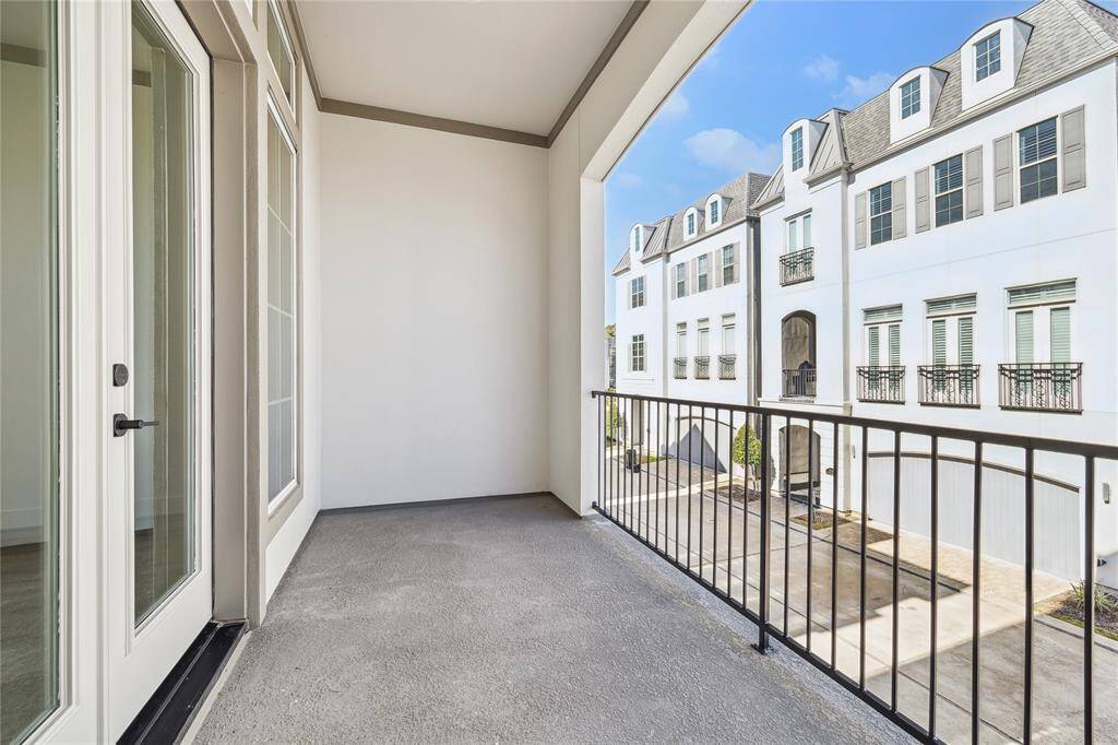 The Amy floor plan has a huge covered second-floor balcony to enjoy. Plenty of room for outdoor furniture and a grill.
