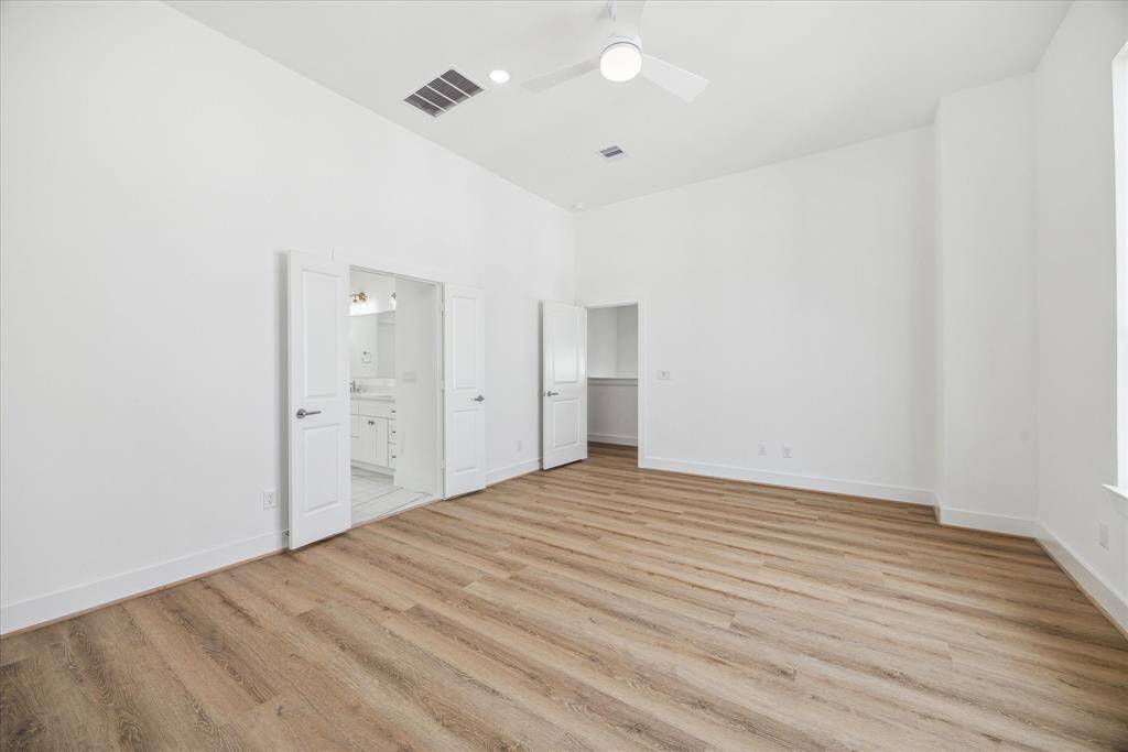 All bedroom floors finished with high end vinyl flooring. Both secondary bedrooms have their own full bathroom.