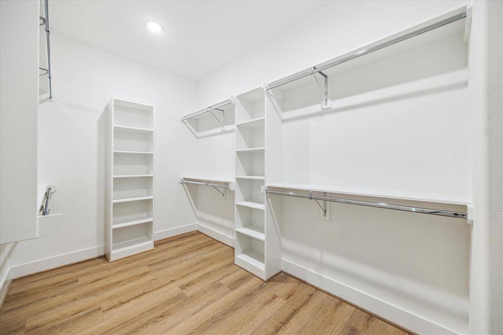 Large walk-in closet is located off the primary bathroom.
