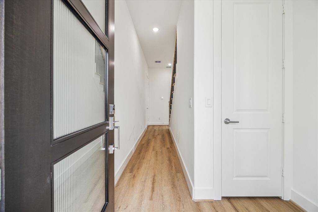 Inviting entryway with beautiful front door