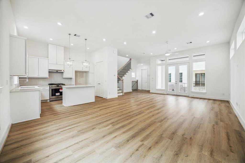 The Amy’s kitchen has stainless steel appliances and faces out towards your dining and living space.