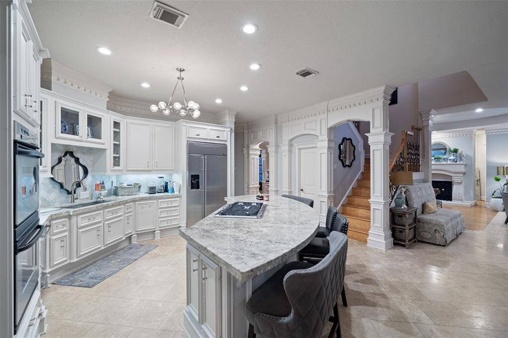 FAMILY ROOM FLOWS BEAUTIFULLY INTO THE GOURMET KITCHEN