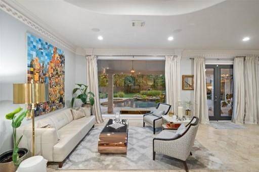 GORGEOUS SITTING AREA OVERLOOKING THE POOL