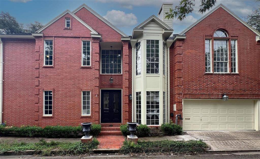 Front with attached 2 car garage