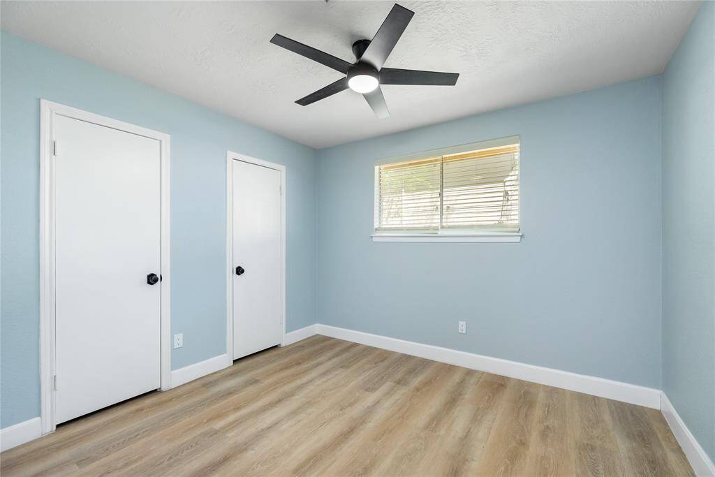 The third of the four bedrooms found downstairs.