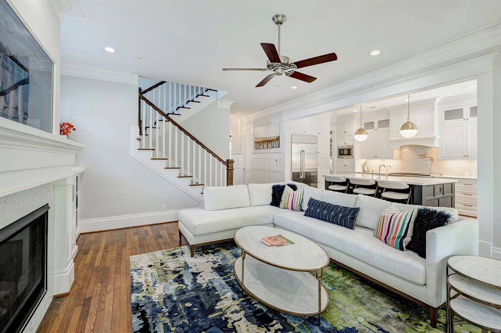 The open-concept family room seamlessly connects to the kitchen, creating the perfect space to socialize with family and friends while preparing meals.
