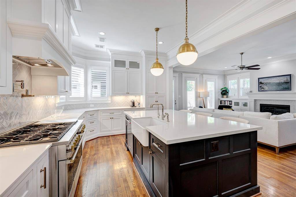 View from the butler’s pantry into the kitchen, highlighting the open-concept layout and seamless flow into the main living spaces.