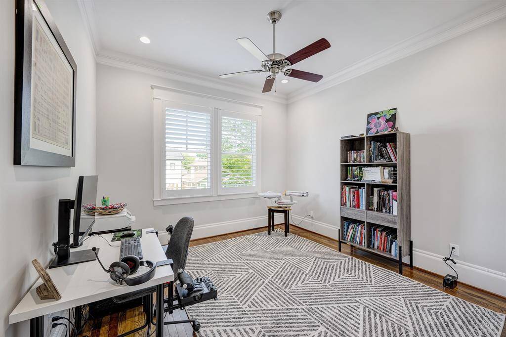Another secondary bedroom, currently serving as a home office.
