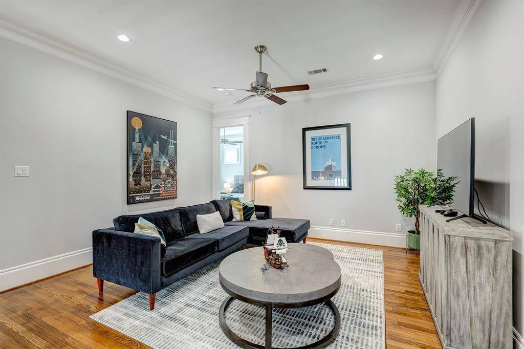 The game or media room is conveniently located at the top of the landing, offering a great space for entertainment.