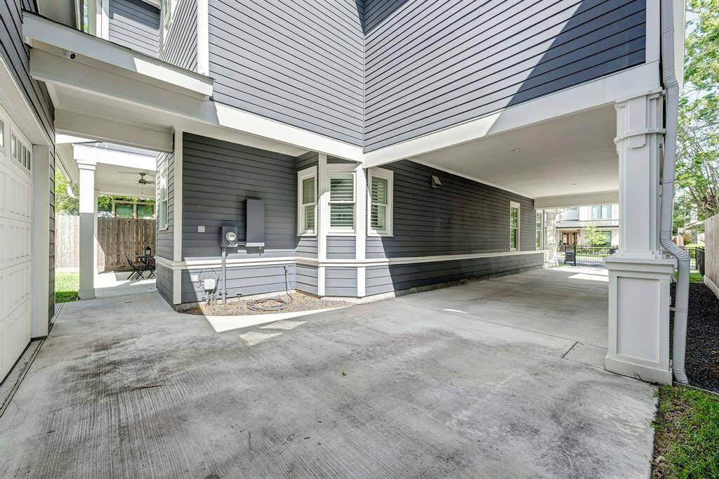Enjoy plenty of parking with a 2-car garage, porte-cochère, and a long driveway.