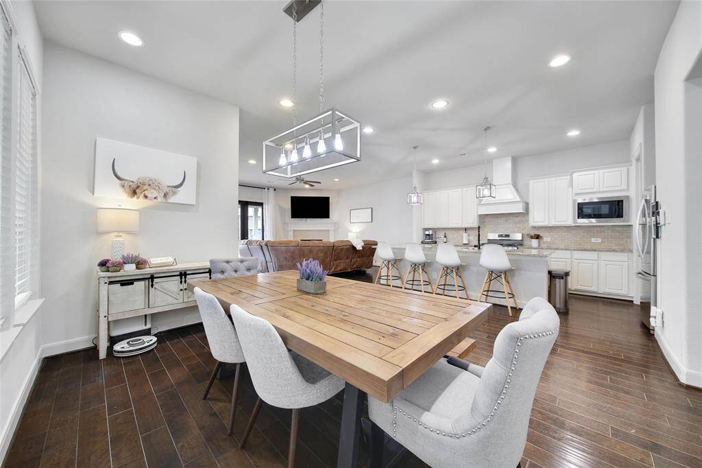 Open concept layout with living, casual dining and kitchen.