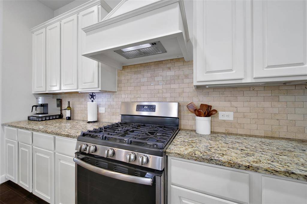 Kitchen is steps away from both dining area and living, perfect flow for entertaining.
