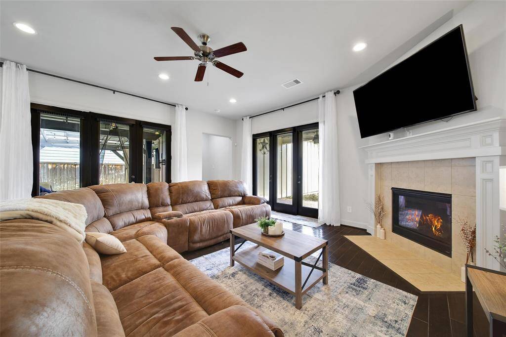 Fireplace tucked into the corner of the living room.