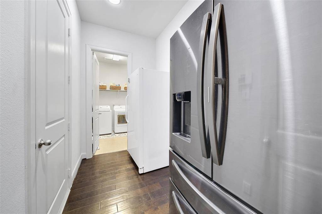 Laundry room is tucked off the mud room with a door to close off!