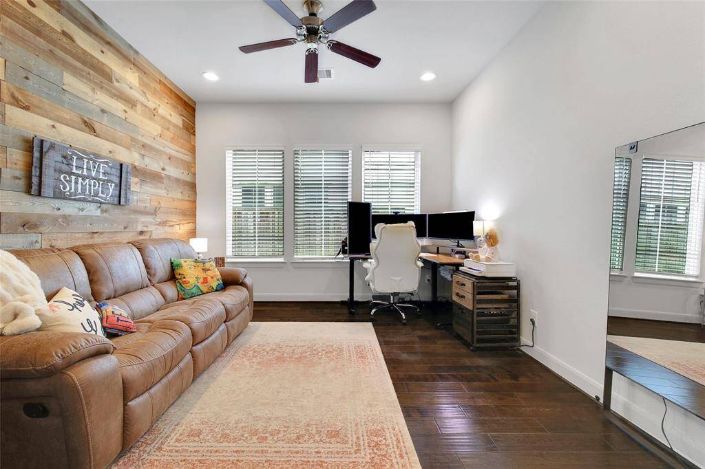 Half bath situated between office area and main living area.