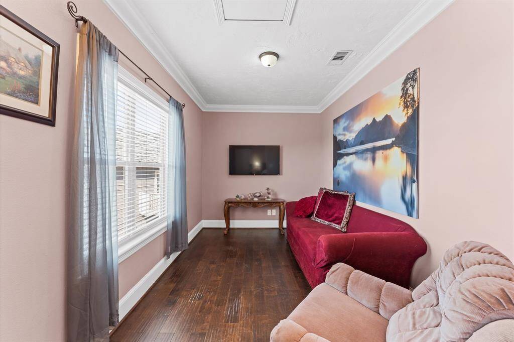 Bonus room off the primary bedroom on the main entertaining level! This room is a perfect study, hobby room, exercise room, casual tv room, nursery...you name it!