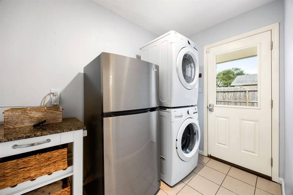 Laundry room with side entrance.
