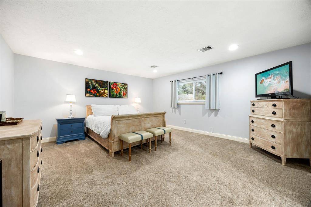 Primary suite includes an ensuite bathroom with large closet.
