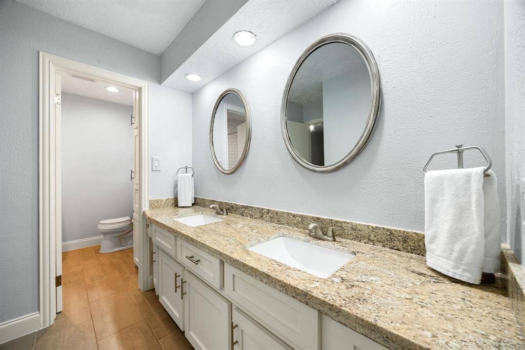2nd full bath includes a double vanity with upgraded fixtures.