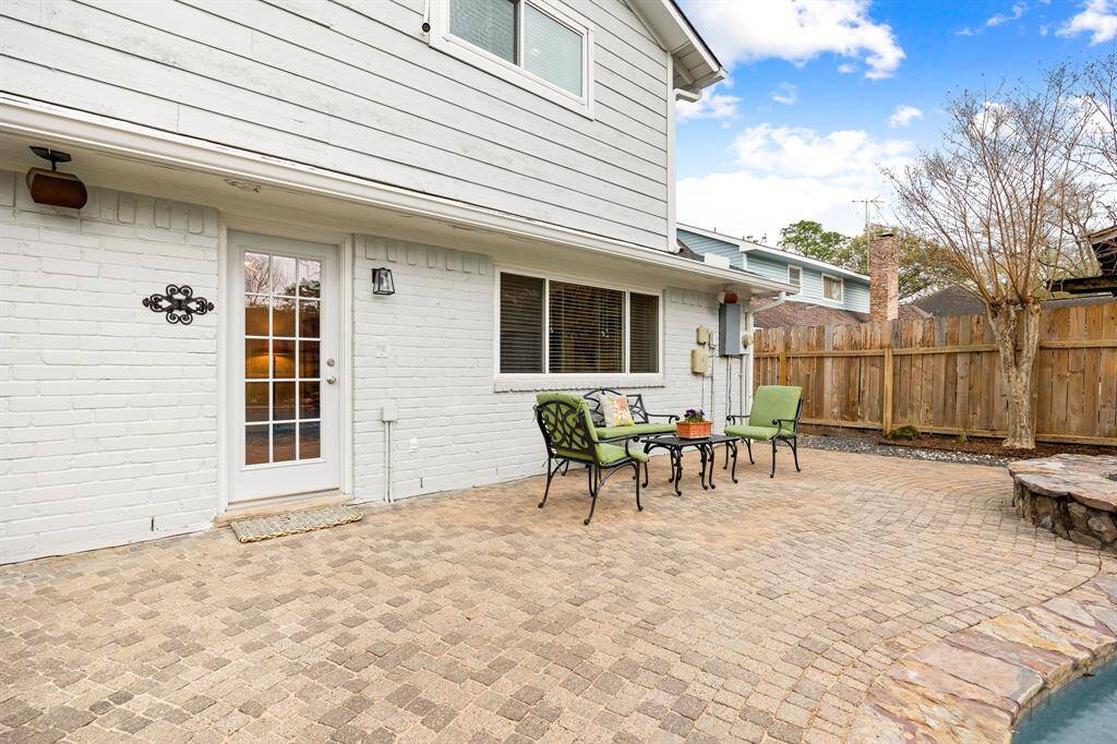 Backyard patio is the perfect space to relax or entertain!