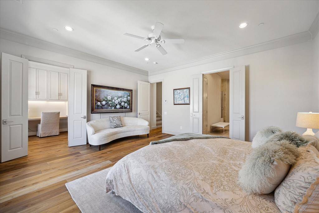 A specious balcony extends from the living area, offering plenty of room for outdoor seating, a grill, and a cozy fireplace - oerfect for relaxing or entertaining in comfort.