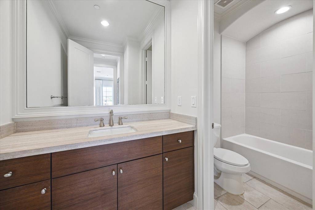 Walk-in shower with designer tile
