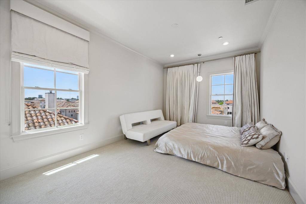 A secondary bedroom on the third floor includes its own private bathroom as well.