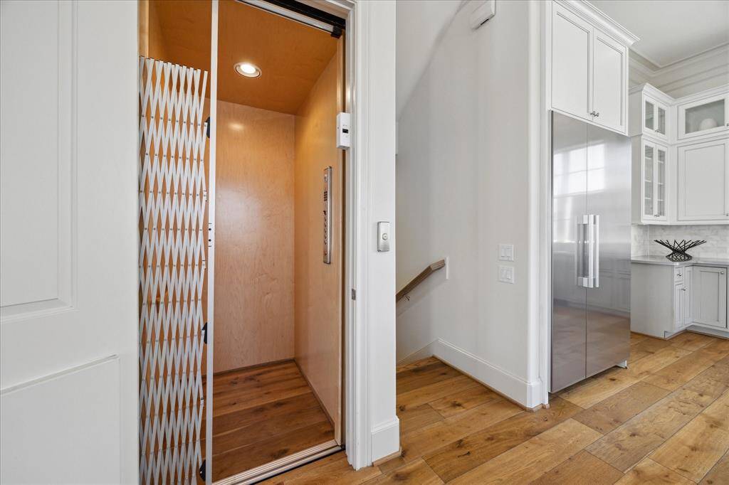 Large game room with the access to the rooftop deck.