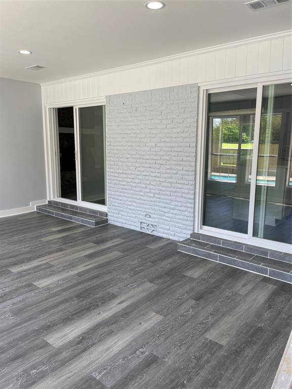 Back glass patio area facing entry to house