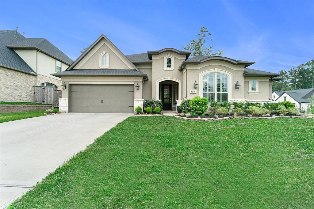 Welcome to your DREAM home at 1235 Tallow Park Lane in this desirable Woodtrace Community!