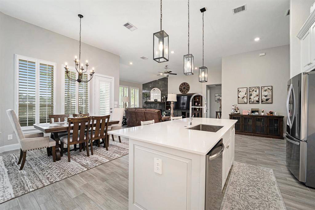 Full view of this elegant kitchen and living room!