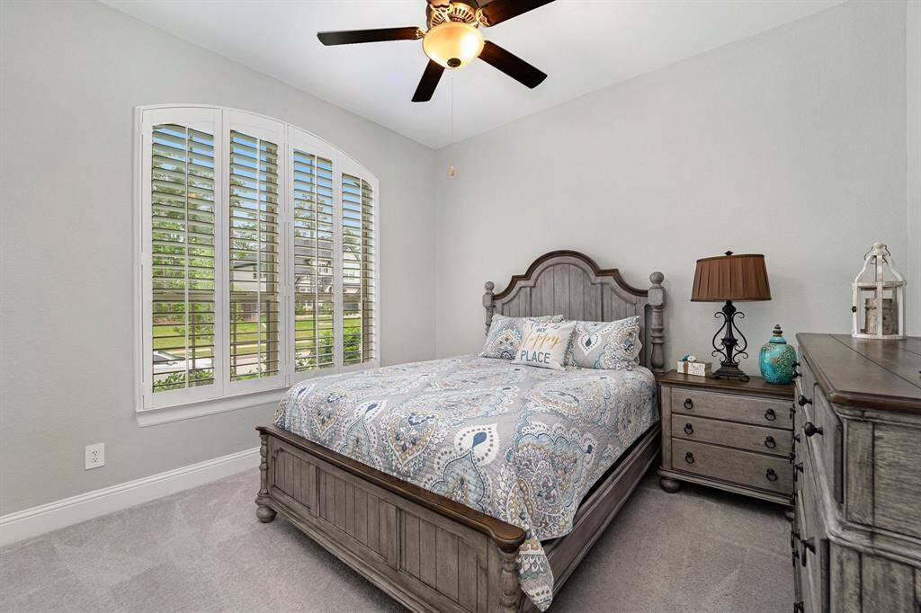 Secondary bedroom with great views of the front yard!