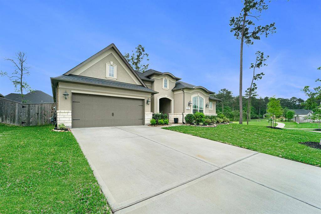This home offers ample curb appeal, tons of parking space, and is on a corner lot!