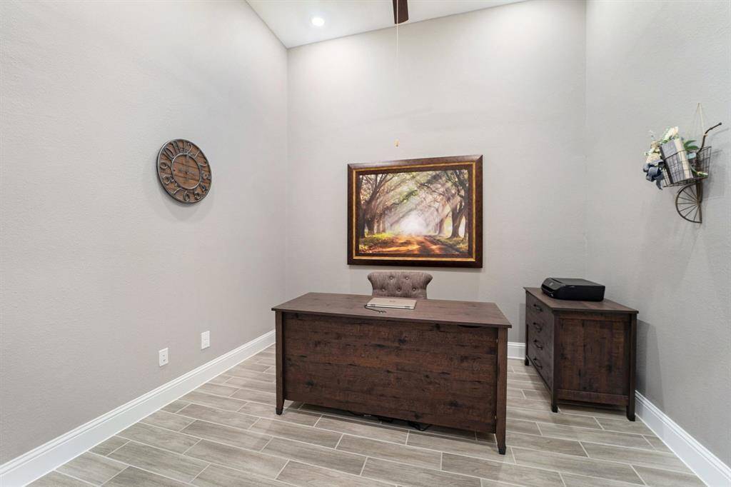 Beautiful home office with high ceilings.