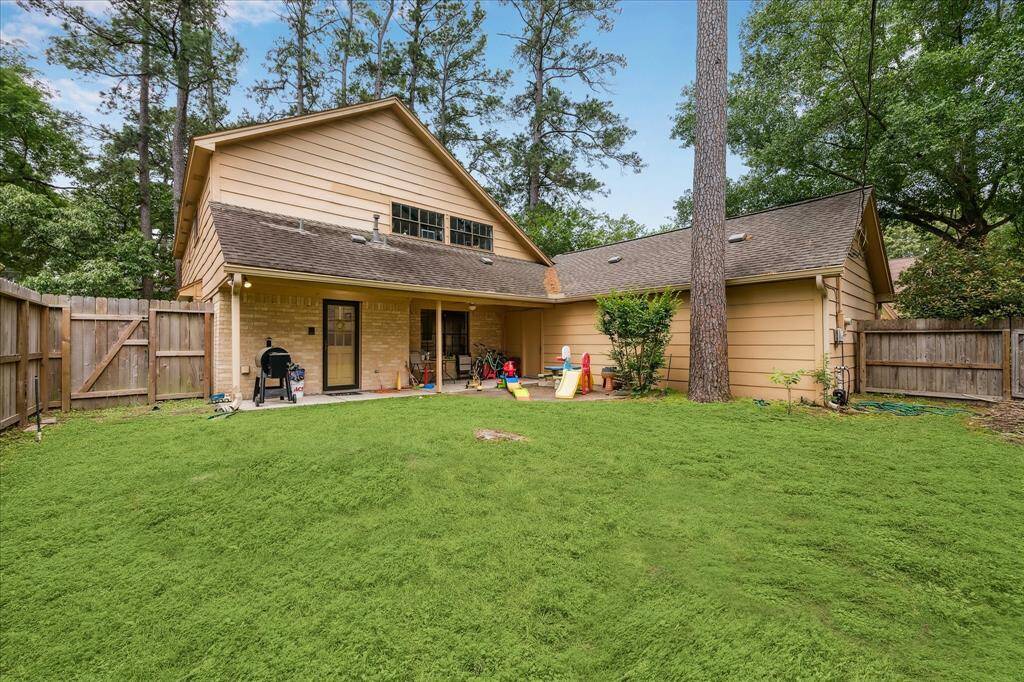 The corner placement of this property provides an oversized backyard with covered patio and private fence.