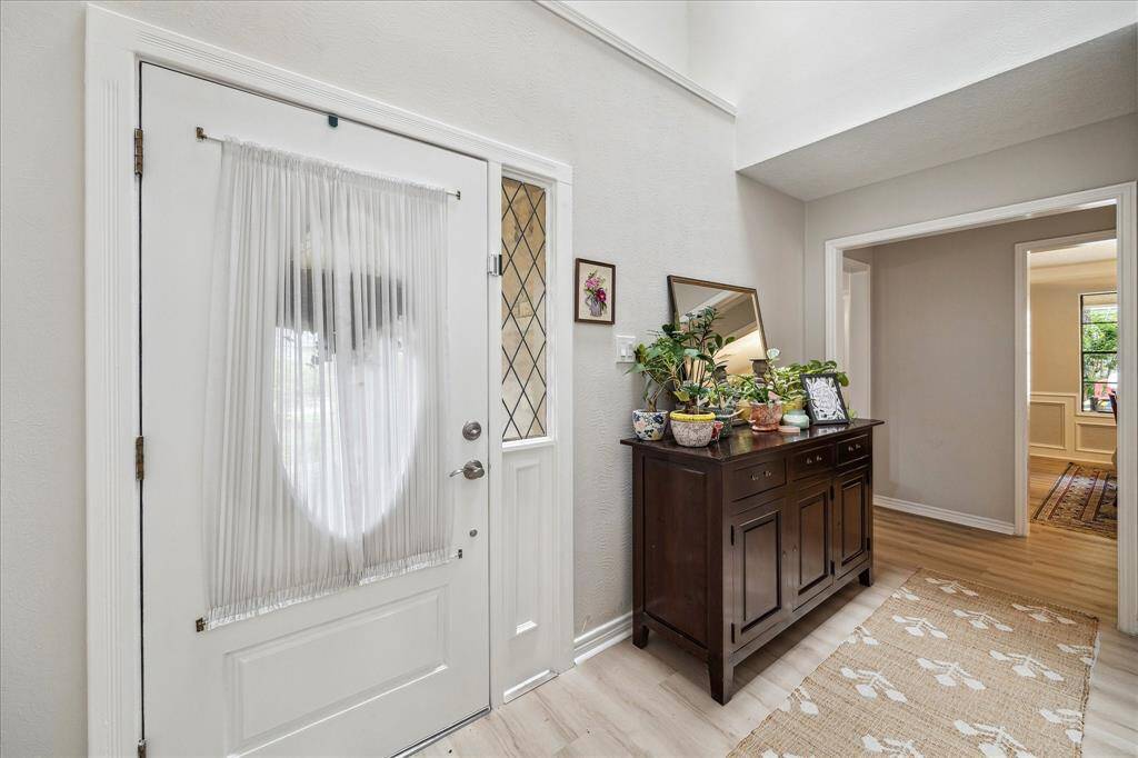 As one steps through the front door into the welcoming foyer you are greeted with the pleasing recently painted neutral palette, crown molding, and recent Luxury Vinyl Plank flooring located throughout the ground floor and carpet on the second floor. PEX piping was installed in 2021 *info per seller