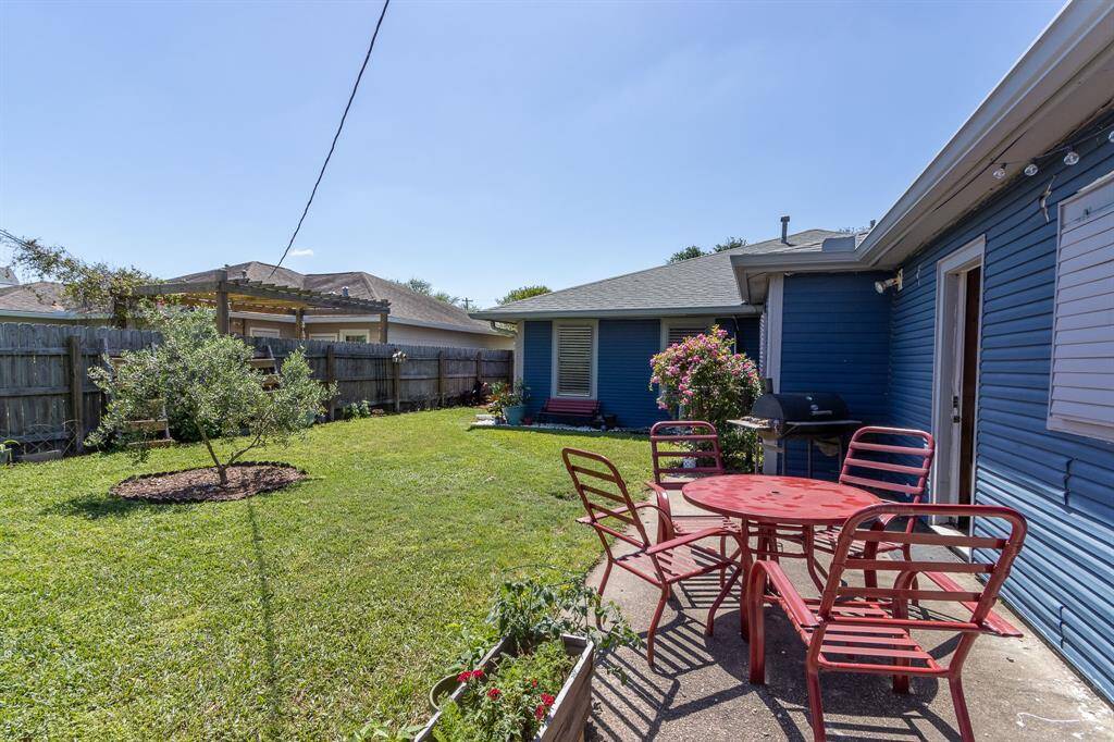 Patio with garage door to the right.
