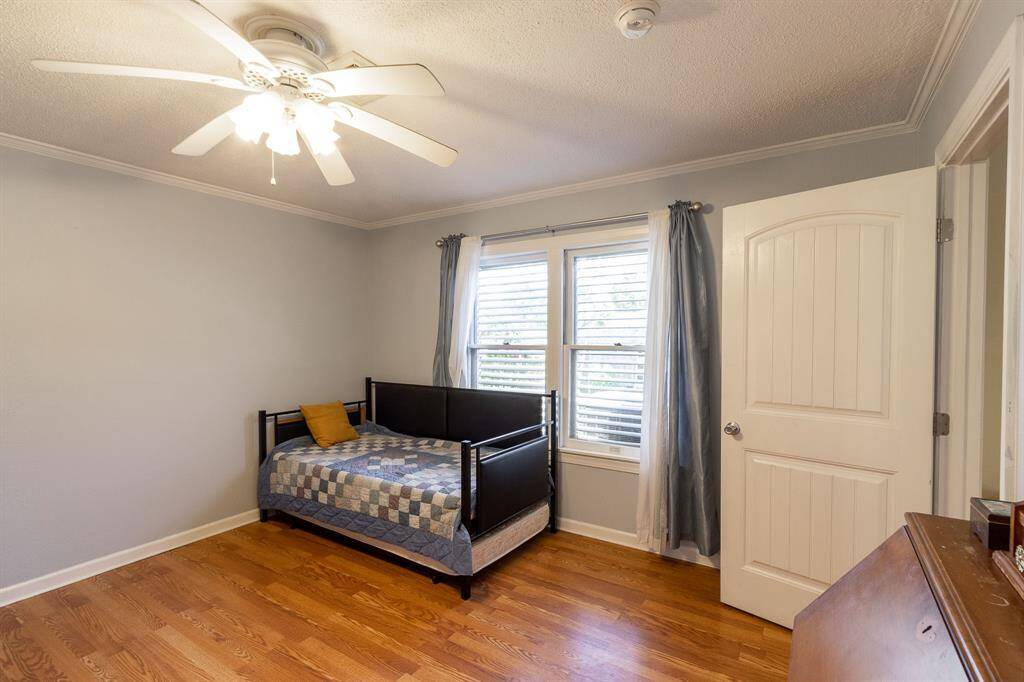 3rd bedroom, also serves as a home office, with door leading into the dining area.