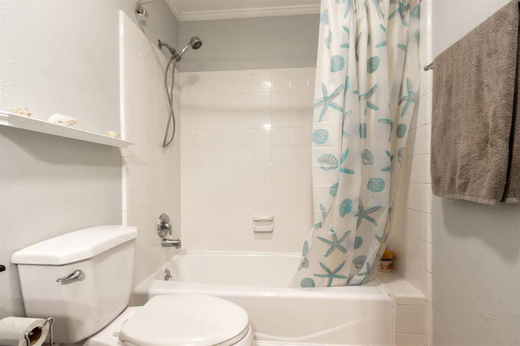 Primary ensuite bath has tub w/shower.