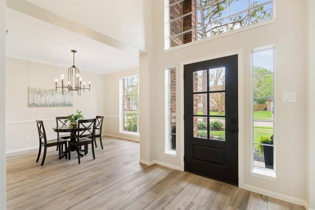 Natural light fills this home through many bright windows and high ceilings in the foyer!