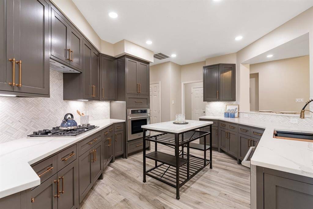 There is plenty of storage space for your personal items with new cabinetry and a pantry!