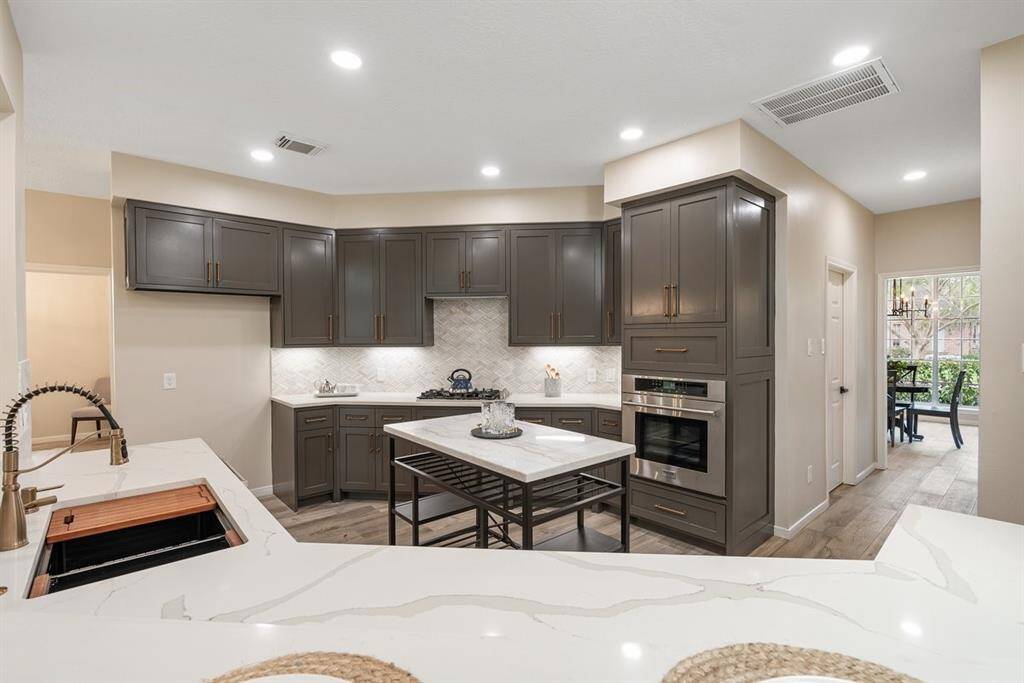 New sink, , dishwasher, gas stove and oven will delight the chef of the home!
