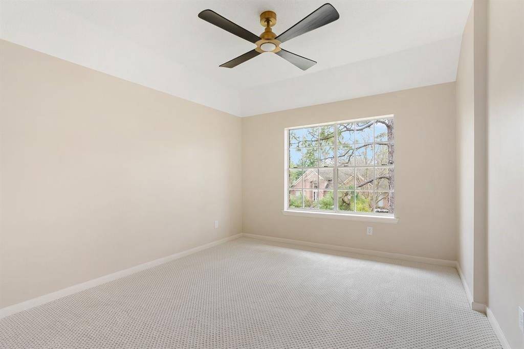 The third bedroom has picturesque views of the street, and an ensuite bathroom!