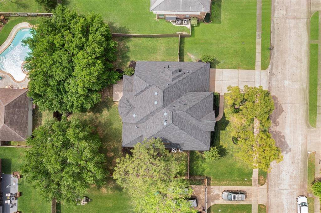 This lot is over a quarter of an acre with mature trees, and a spacious backyard!