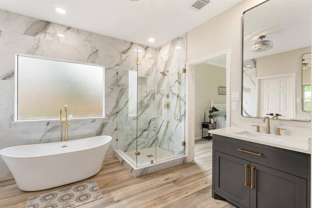 Professionally designed, this bathroom has contemporary features and touches of character!