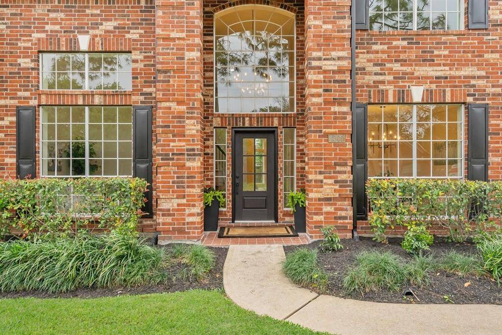 A charming exterior and new front door welcome you home each day!
