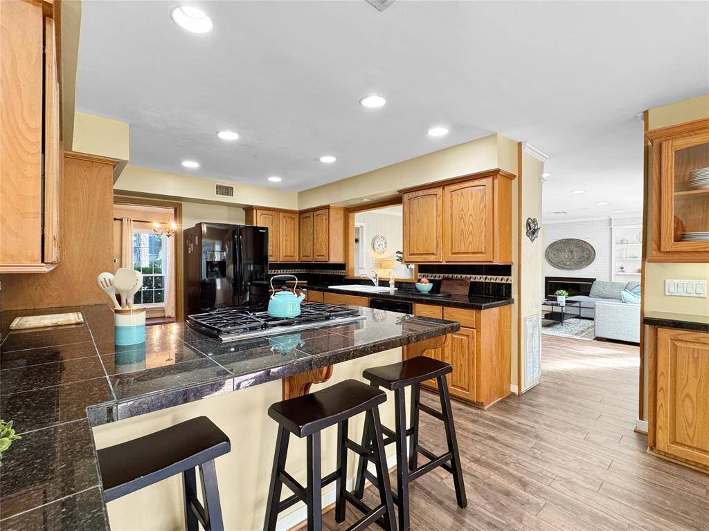 Great size kitchen with breakfast bar.